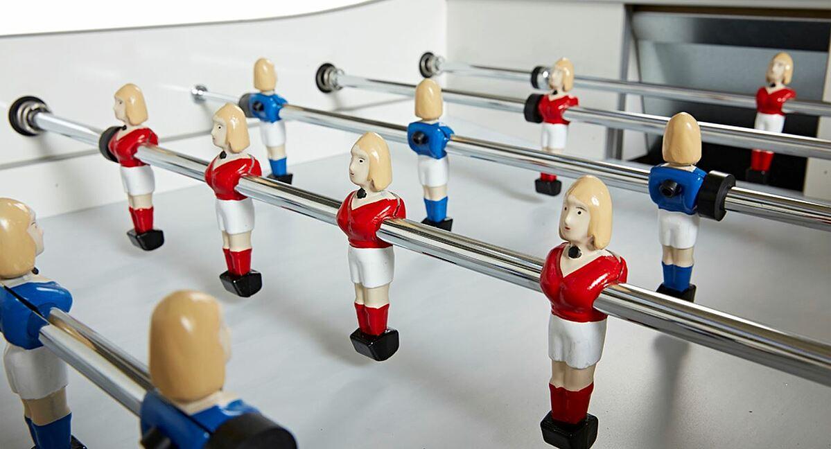 Women in sport, football table designed with female figurines